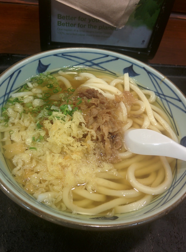 Niku udon -- has the same broth as the Kake udon topped with sweet beef and caramelized onions.